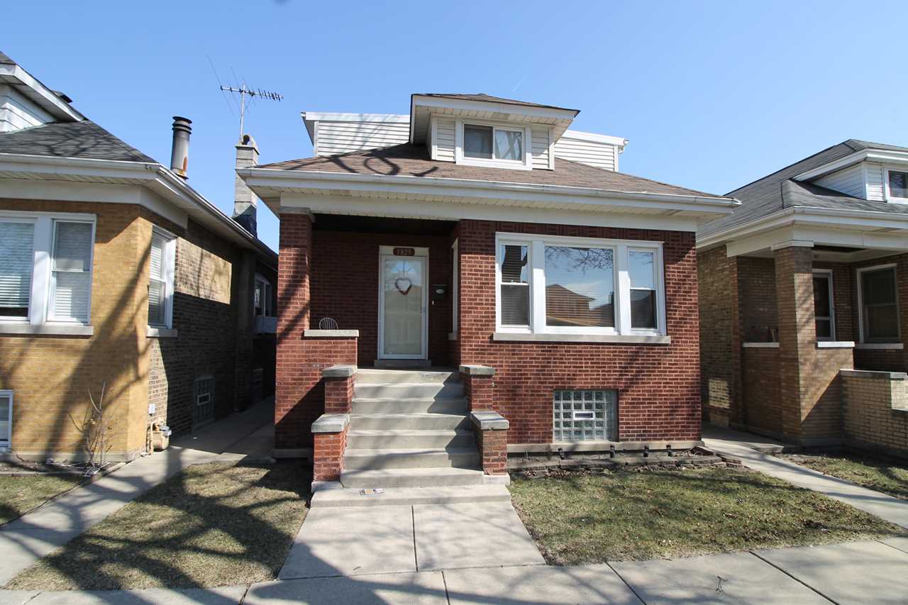 1829 N Lowell Ave Chicago, IL 60639 | MLS 09889411 Photo 1