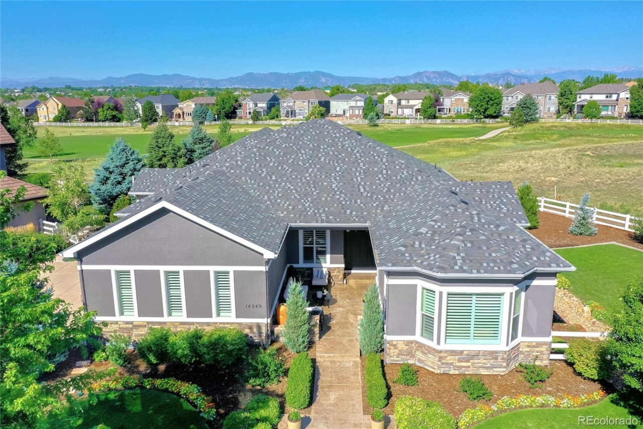 14249 Augusta Dr The Broadlands Exquisite custom ranch home situated in