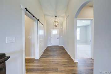 308 Mcdowell Dr in Marion Twp, MI Photo 2