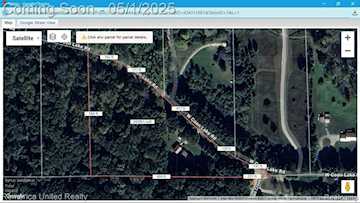 6565 W Coon Lake Rd in Iosco Twp, MI Photo 2