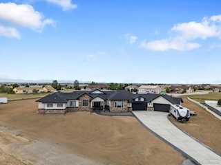 29151 E 165th Ave Hayesmount Estates Sub Sitting on 2.28 acres at the end of a cul-de-sac with no HOA, this 6,832 sq ft custom home with a 4... Brighton Adams CO 80603 4545138 home for sale $1,695,000 4545138 Photo 3