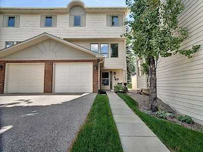 64 Woodacres Crescent SW #14 Calgary, AB T2W 4V6