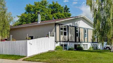 208 Queensland Drive SE Calgary, AB T2J 3R7