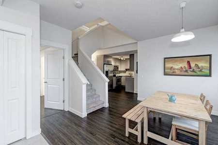 59 West Coach Manor SW #6 Calgary, AB T3H 1R7