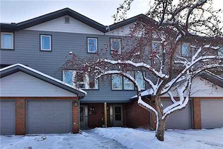 64 Woodacres Crescent SW #6 Calgary, AB T2W 4V6