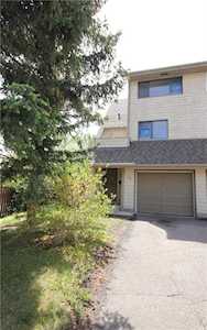 163 Woodvale Bay SW Calgary, AB T2W 3P8