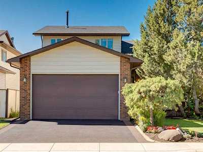 67 Woodford Crescent SW Calgary, AB T2W 4C6