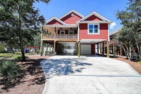 211 NE 64th Street Oak Island Wooded, NC 28465