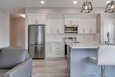 370 Harvest Hills Common NE #103 Calgary, AB T3K 2M8