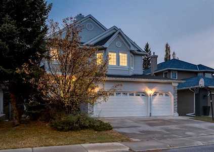 87 Woodpark Circle SW Calgary, AB T2W 6E9