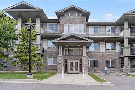 48 Panatella Rd NW #112 Calgary, AB T3K 0V4