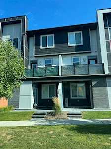 225 Redstone #203 Calgary, AB T3N 1M6