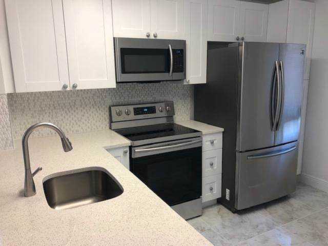 6795 Huntington Lane #303 Delray Beach, FL 33446 | MLS RX-10504060 Photo 1