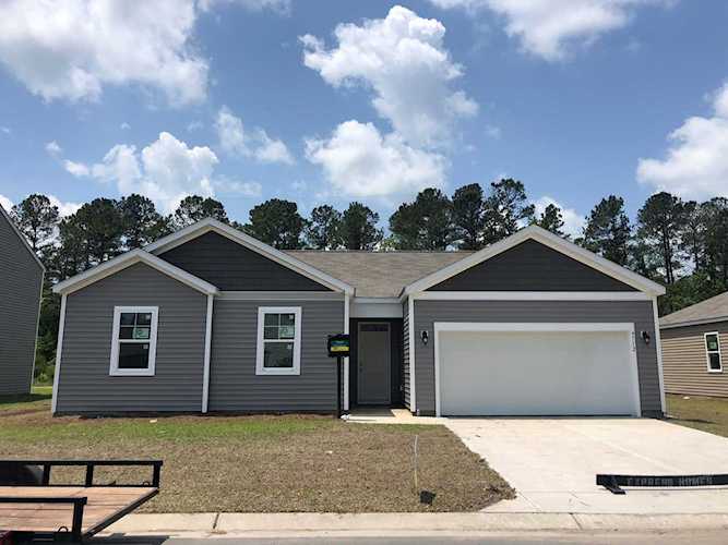 Home For Sale At 9712 Woodriff Circle, Leland NC in Sunrise Terrace Photo 1