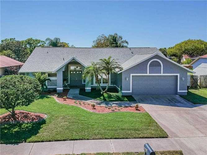 443 Hammock Drive Palm Harbor, FL 34683 | MLS J904668 Photo 1