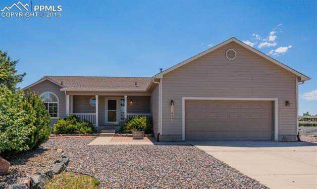 12435 Snaffle Bit Road Peyton CO 80831 - MLS 4884573 - Ashford Photo 1