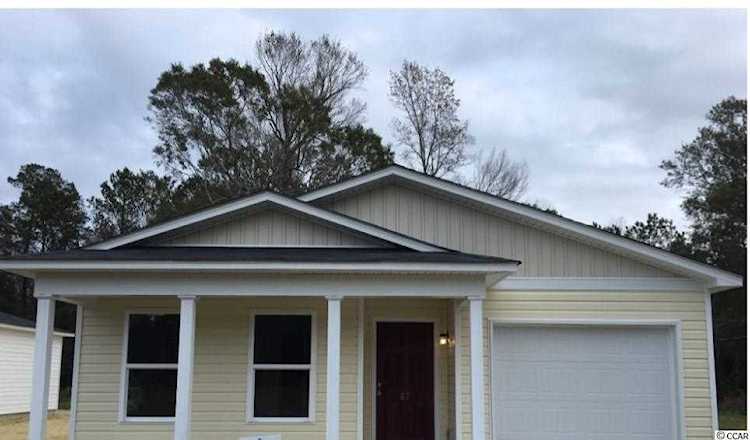 The Boldness Of The Metal Siding Is Softened By The Muted Color Choice Metal Siding House House Exterior House Siding