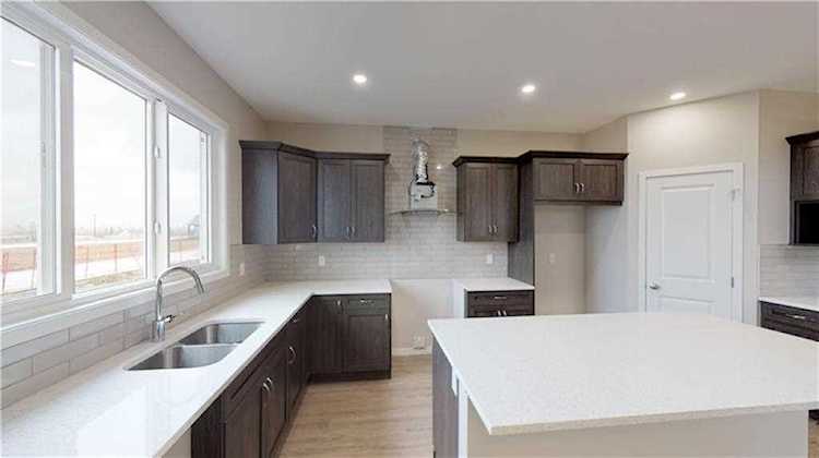 83 Wolf Creek Manor SE Calgary, AB T2X 3Z9