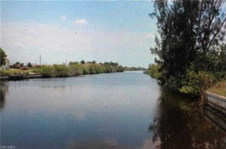 1051 NW 36th Place Cape Coral, FL 33993 | MLS 220063778 Photo 1