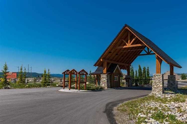 325 Cottageclub Way Rural Rocky View County, AB T4C 1B1