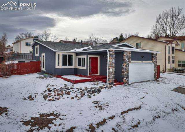 3585 Point of the Rocks Drive Colorado Springs CO 80918 - MLS 2155049 - Ashford Photo 1