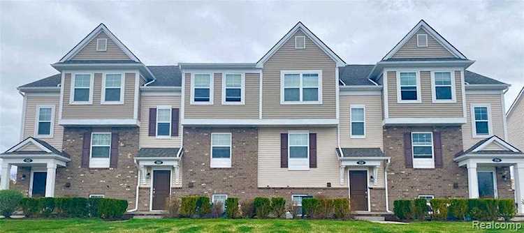Metro Detroit House Finder | Dwellings Michigan Real Estate Photo 1