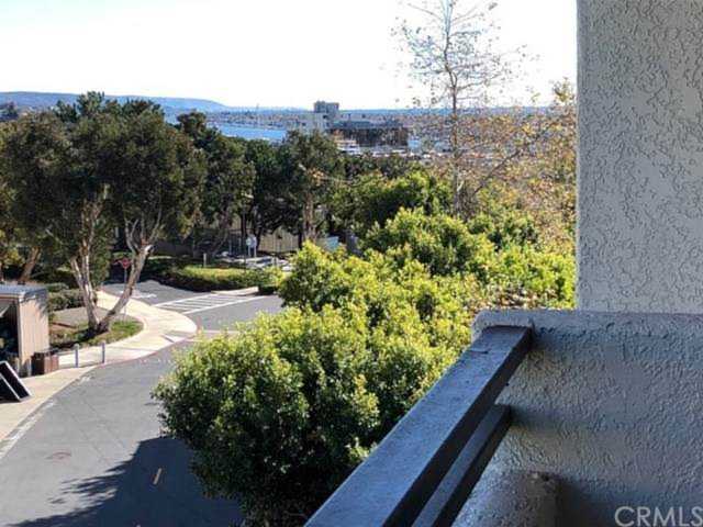 MLS #NP21078446 - 260 Cagney Ln #305 Newport Beach, CA 92663 - $3,200 / month Photo 1