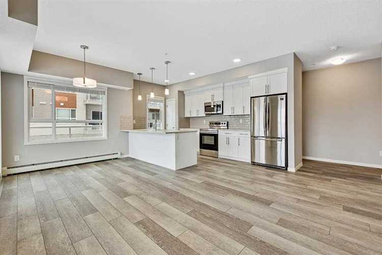 360 Harvest Hills Common NE #201 Calgary, AB T3K 2M7