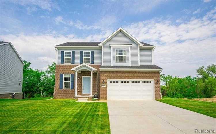 885 N Mill St South Lyon, MI 48178 | MLS 2210038835 Photo 1