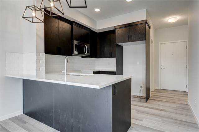 200 Harvest Hills Place NE #412 Calgary, AB T3K 2P4