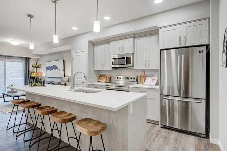 200 Harvest Hills Place NE #411 Calgary, AB T3K 2P4