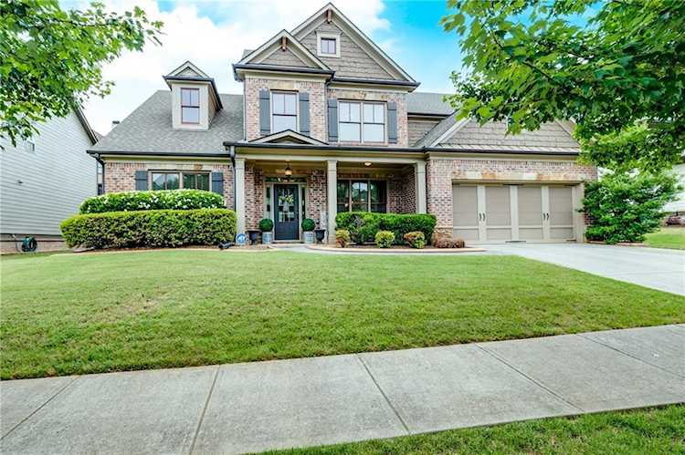 1156 Whisper Cove Dr Buford, GA 30518 | MLS 6892320 Photo 1