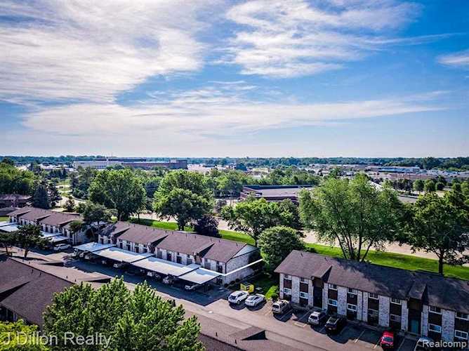 7340 Woodview St Apt 4 #19 Westland, MI 48185 | MLS 2210043071 Photo 1