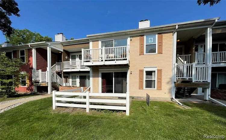 2034 Hamilton Rd Unit #105 Meridian Twp, MI 48864 | MLS 2210058853 Photo 1