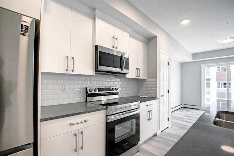 200 Harvest Hills Place #310 Calgary, AB T3K 2N3