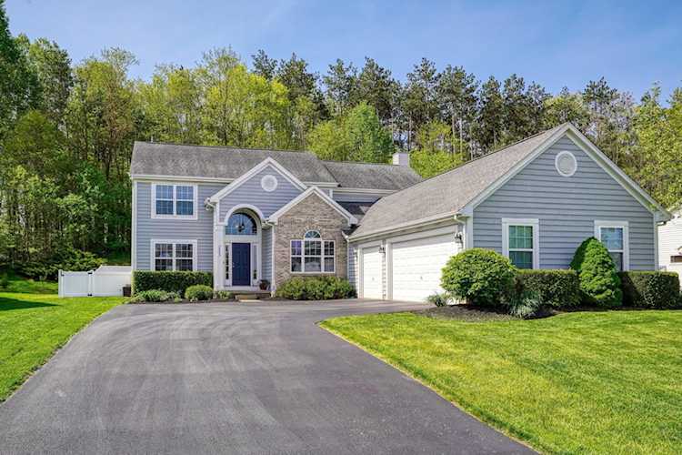 For Sale: $485,000 A home for sale for sale at 7593 Murdock Lane Canal Winchester, OH 43110 - Franklin. MLS 222015553 - This Summer will be great with your own in ground heated/cooled pool! A wonderful home that backs... Photo 1