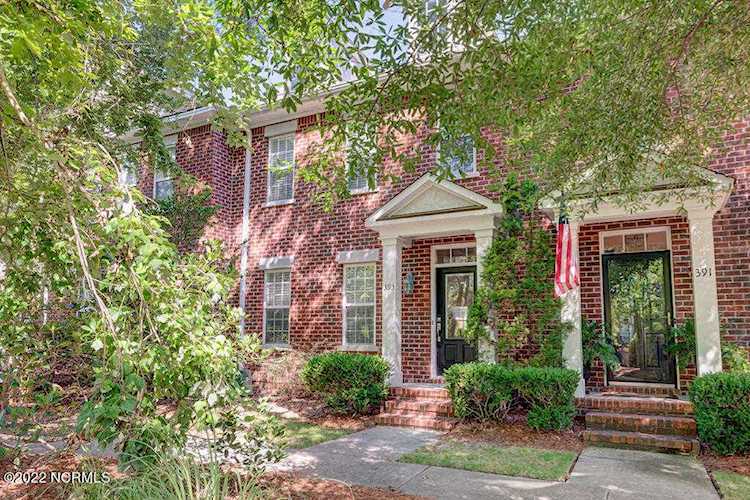 Real Estate & property in Wilmington NC at 393 Whisper Park Drive in the Demarest Village community Photo 1