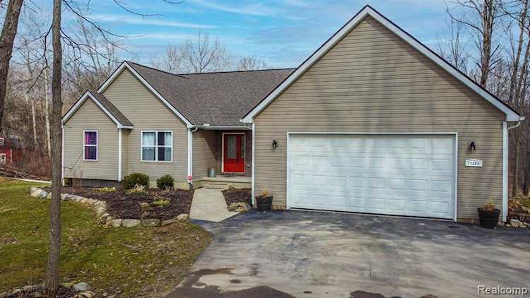 11204 Big Lake Rd Springfield Twp, MI 48350 | MLS 2220015935 Photo 1