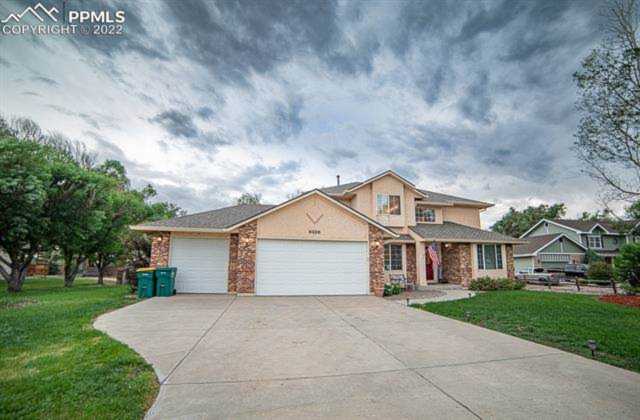 9330 Blue Grass Place Colorado Springs, CO 80925 | Ashford Realty Group Photo 1