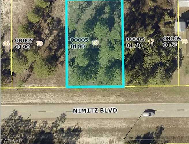 723 Nimitz Blvd Lehigh Acres, FL 33974 | MLS 222067015 Photo 1