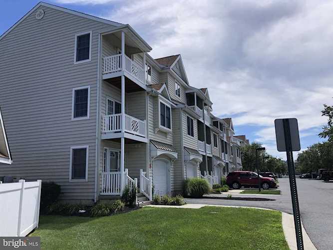 9823 Golf Course Rd #15 Ocean City MD is a home for sale | BEACHLIFE | Sailors Watch Photo 1