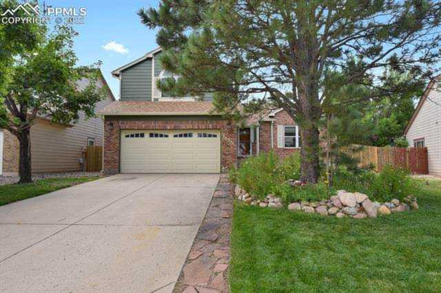 1455 Tamarisk Drive Colorado Springs, CO 80906 | Ashford Realty Group Photo 1