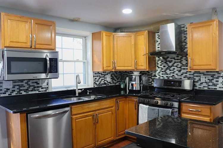 101 Sparks St #1 in Lowell, MA - Century 21 New England Photo 1