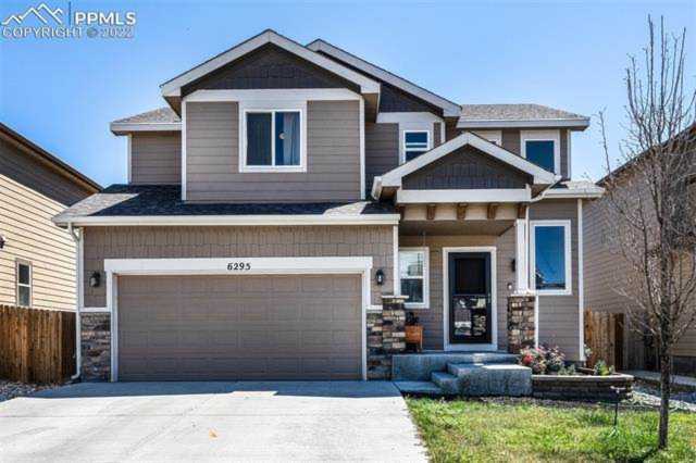 6295 Wallowing Way Colorado Springs, CO 80925 | Ashford Realty Group Photo 1