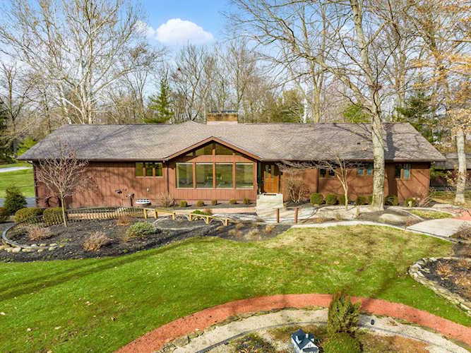 For Sale: $675,618 A home for sale for sale at 7320 Macbeth Drive Dublin, OH 43016 - Franklin. MLS 223003339 - Looking for a fully accessible Ranch in Dublin on acreage with privacy? This tranquil home was... Photo 1