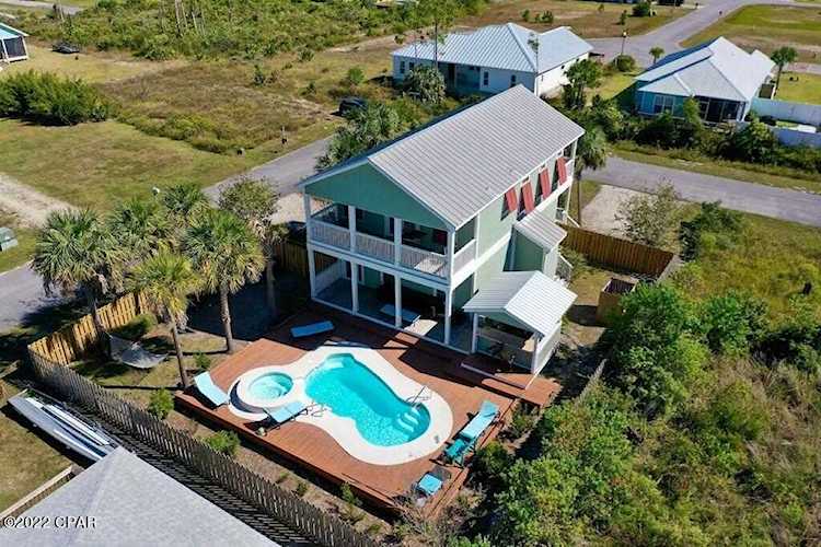 233 Charles Corner Mexico Beach FL 32456 733936 Grand Isle S-Mexbch 15 home for sale Located only minutes away from the white sandy beaches of Mexico Beach...this newly renovated home... Photo 1