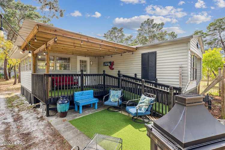570 Sandy Ln Panama City Beach FL 32413 739160 No Named Subdivision home for sale ''CURRENTLY UNDER CONTRACT, SELLER WILL CONSIDER BACKUP OFFERS.'' This tastefully renovated... Photo 1