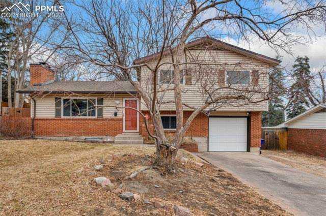 1411 Holmes Drive Colorado Springs, CO 80909 | Ashford Realty Group Photo 1