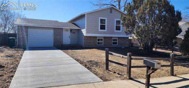 7445 Cabin Ridge Drive Colorado Springs, CO 80911 | Ashford Realty Group Photo 1