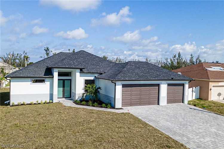 2715 NW 10th St Cape Coral, FL 33993 | MLS 223034960 Photo 1